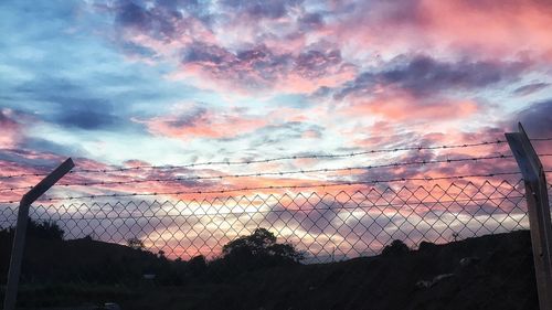 Scenic view of dramatic sky during sunset