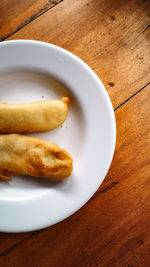 High angle view of bread in plate on table