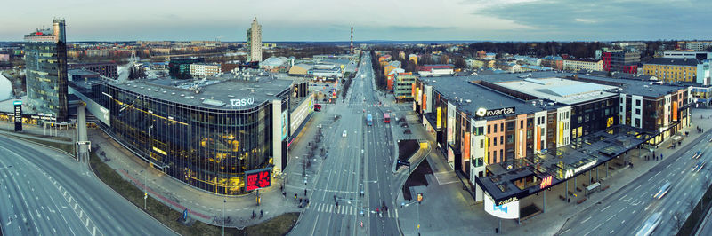 High angle view of road amidst buildings against sky