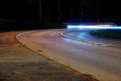 Light trails on road at night