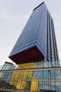 Low angle view of modern building against sky