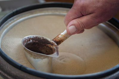 Close-up of person preparing food