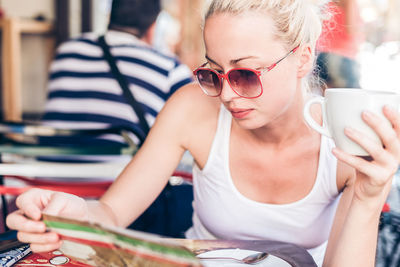 Young woman wearing sunglasses