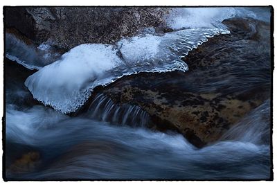 Scenic view of waterfall in winter