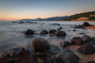 Scenic view of sea against sky during sunset