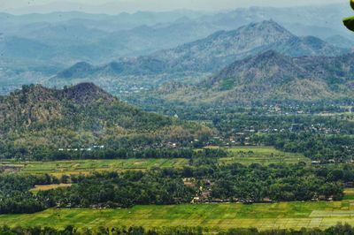 Scenic view of field against mountains
