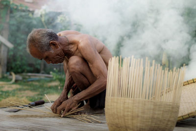 Man working on wood