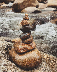 Close-up of stone stack on rock