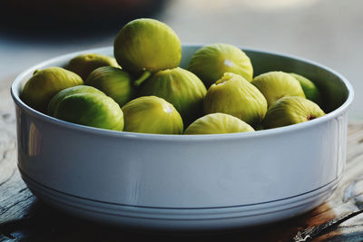 Close-up of fruits in bowl on table
