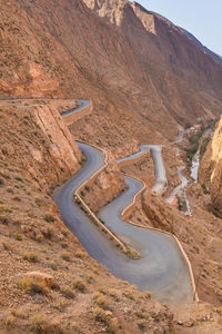 High angle view of winding road on land