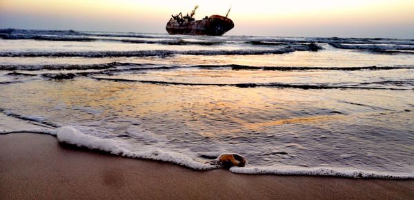 Scenic view of sea against sky during sunset