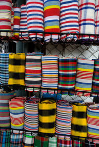 Multi colored textile for sale at market stall