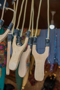 Close-up of clothes hanging on wood