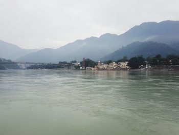 View of lake with mountain range in background