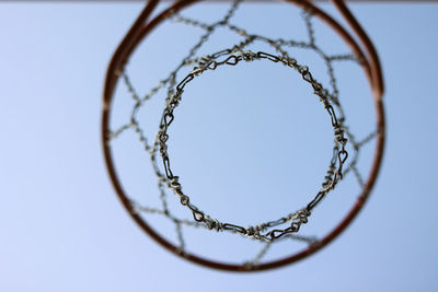 Directly below shot of metal against blue background