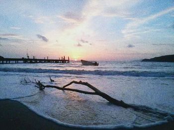 Scenic view of sea at sunset