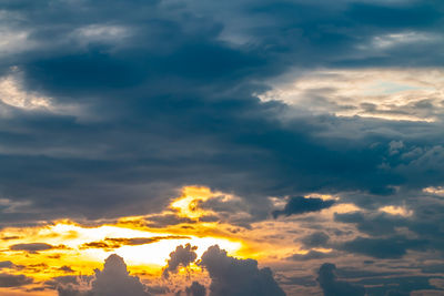 Low angle view of cloudy sky during sunset