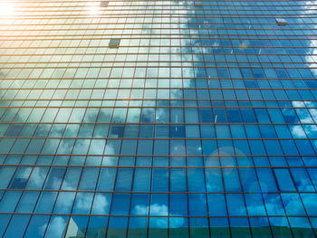 Low angle view of swimming pool against blue sky