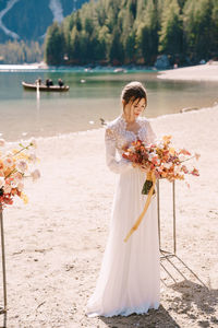 Woman holding flower bouquet