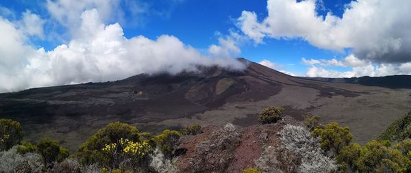 Panoramic view of volcanic mountain against sky