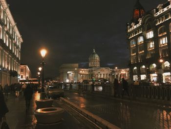 Illuminated buildings in city at night