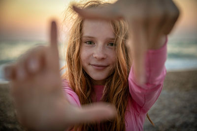 Portrait of young woman looking away