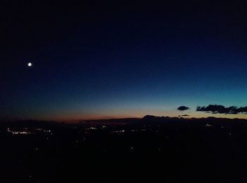 Scenic view of landscape against sky at night