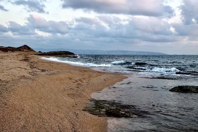 Scenic view of beach against sky