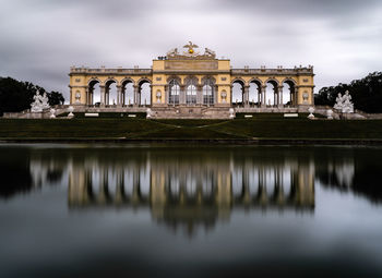 Reflection of summer gloriette in the gardens of schönbrunn palace