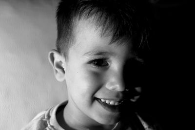 Close-up portrait of smiling boy