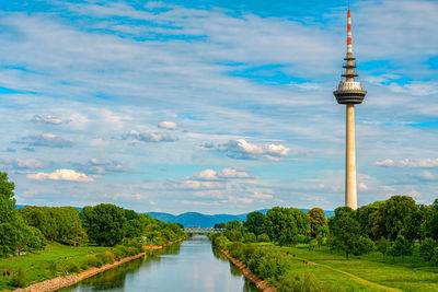 View of tower against cloudy sky