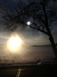 Scenic view of beach against sky during sunset