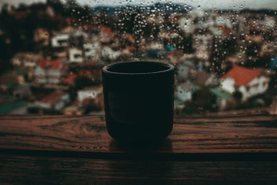 Close-up of coffee cup on table