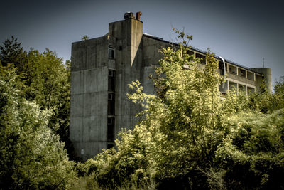 Low angle view of old building against sky