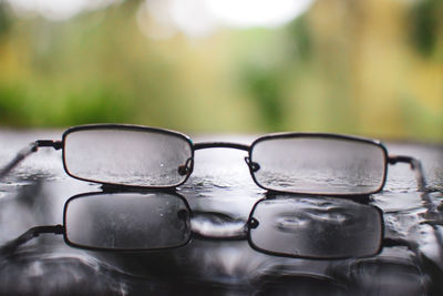 Close-up of sunglasses on table