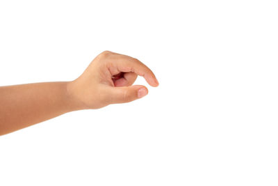 Close-up of woman hand against white background