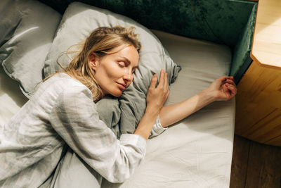 Young caucasian woman is sleeping. the concept of a healthy daytime sleep.