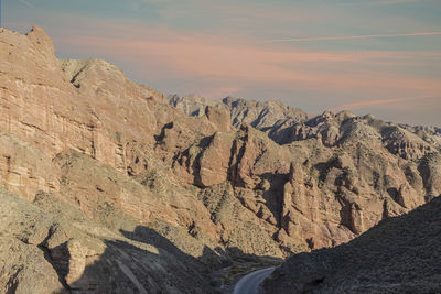 Scenic view of landscape against sky during sunset