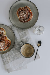 Coffee and freshly baked pastries on table