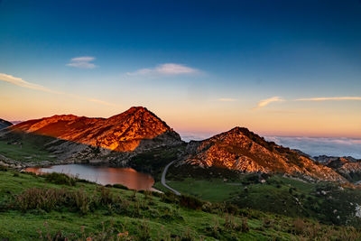 Scenic view of mountains against sky during sunset