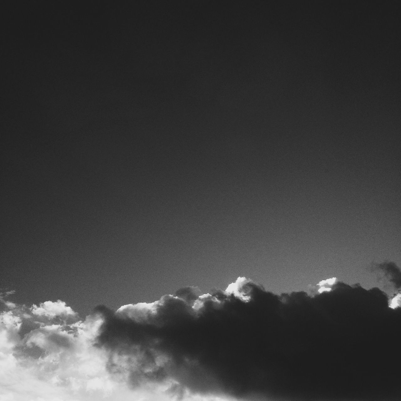 low angle view, sky, beauty in nature, cloud - sky, tranquility, scenics, tranquil scene, nature, copy space, cloudy, sky only, cloud, cloudscape, silhouette, idyllic, outdoors, no people, weather, overcast, dusk