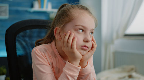 Portrait of cute girl at home