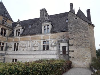 Low angle view of old building against sky