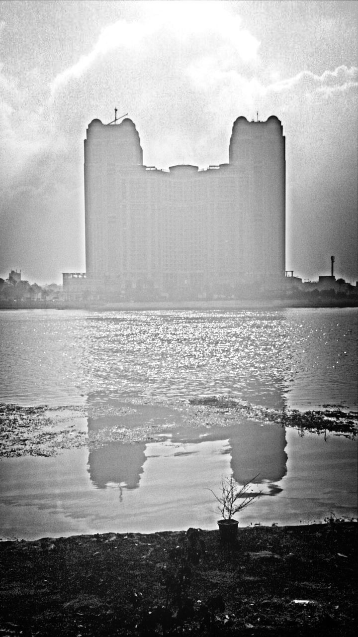 building exterior, built structure, architecture, sky, water, cloud - sky, weather, sea, religion, cloudy, place of worship, spirituality, day, outdoors, nature, no people, church, travel destinations, tranquility