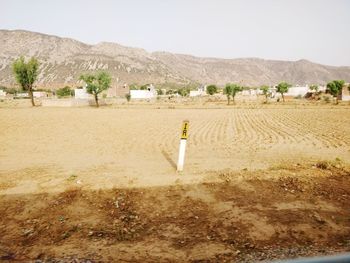 Scenic view of desert against sky