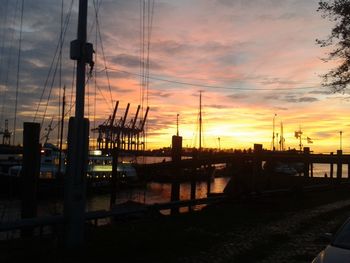 View of harbor at sunset