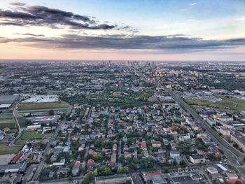 Aerial view of cityscape against sky