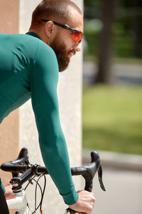 Young man exercising in gym