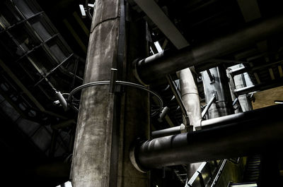 Low angle view of wooden poles in old building