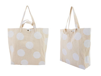 Close-up of paper hanging against white background